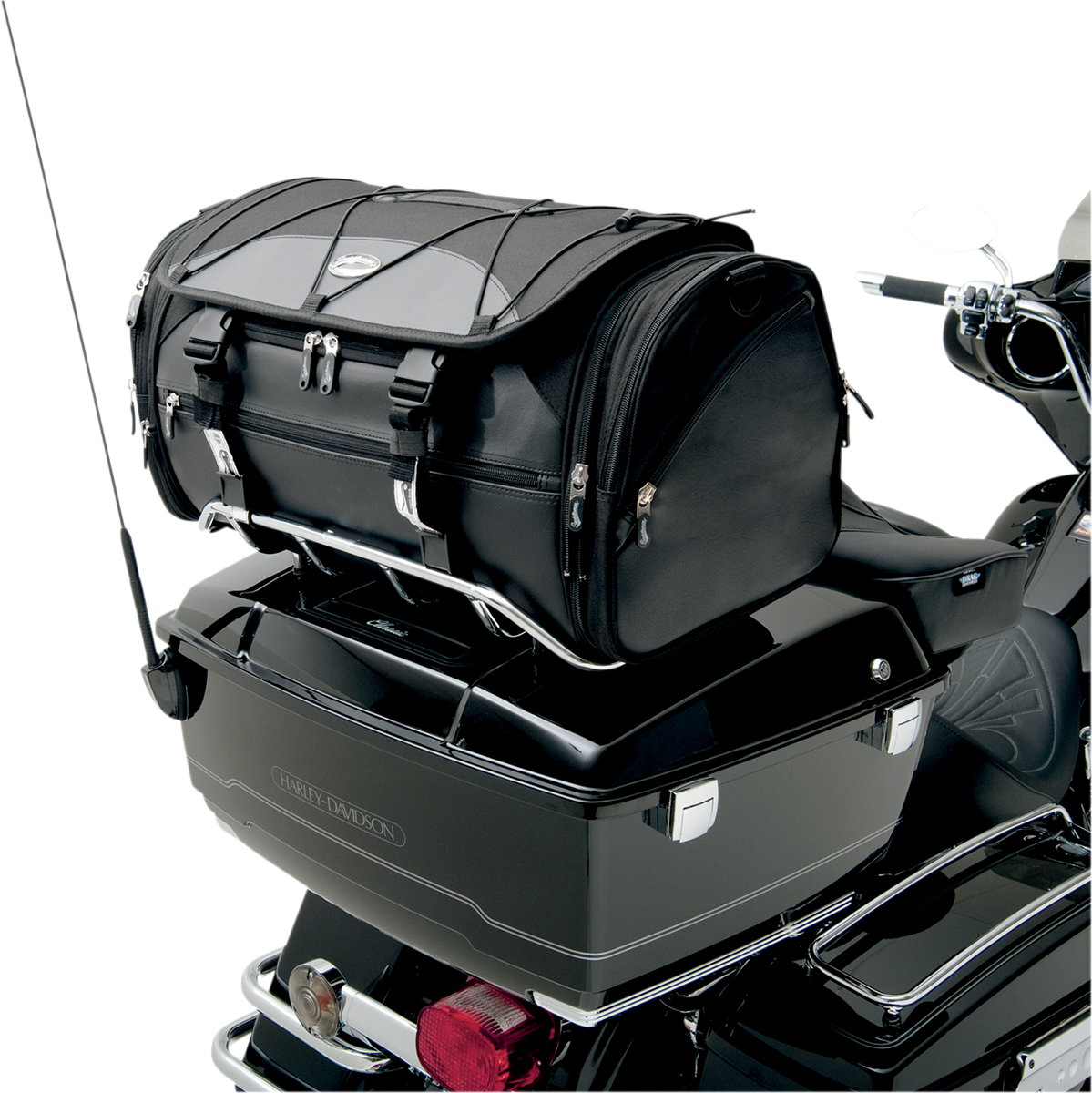 Bill's Exhausts SADDLEMEN TR3300DE Deluxe Rack Bag seat mounted on motorcycle with straps and storage compartments.