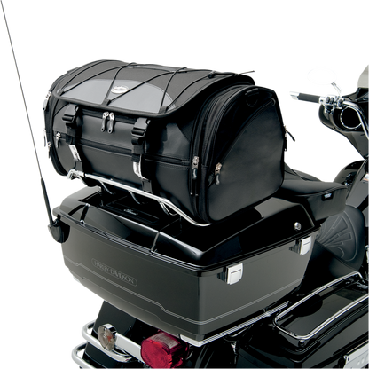 Bill's Exhausts SADDLEMEN TR3300DE Deluxe Rack Bag seat mounted on motorcycle with straps and storage compartments.