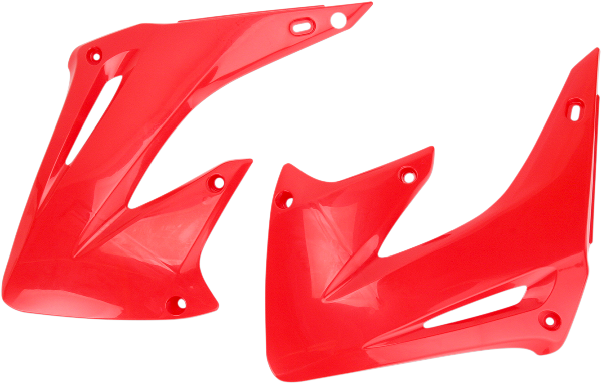 Red ACERBIS radiator shrouds for motorcycle body, featuring sleek design and vibrant color, compatible with various models.
