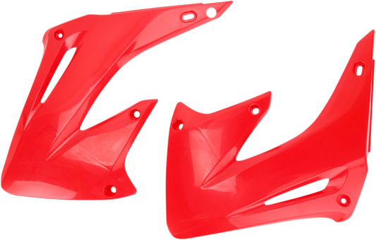 Red ACERBIS radiator shrouds for motorcycle body, featuring sleek design and vibrant color, compatible with various models.