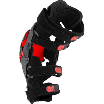 Alpinestars RK-1 Plasma knee braces in black and red, size L/XL, with adjustable straps and protective padding.