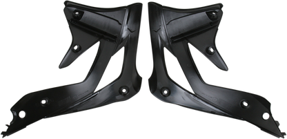 Acerbis black radiator shrouds for motorcycles, designed to protect and enhance the body of the bike, with sleek black finish.