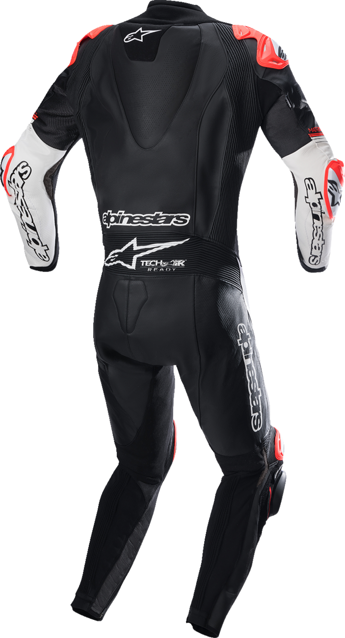 Alpinestars GP Tech Suit v4 in black and white, leather motorcycle racing suit with protective panels and sleek design.