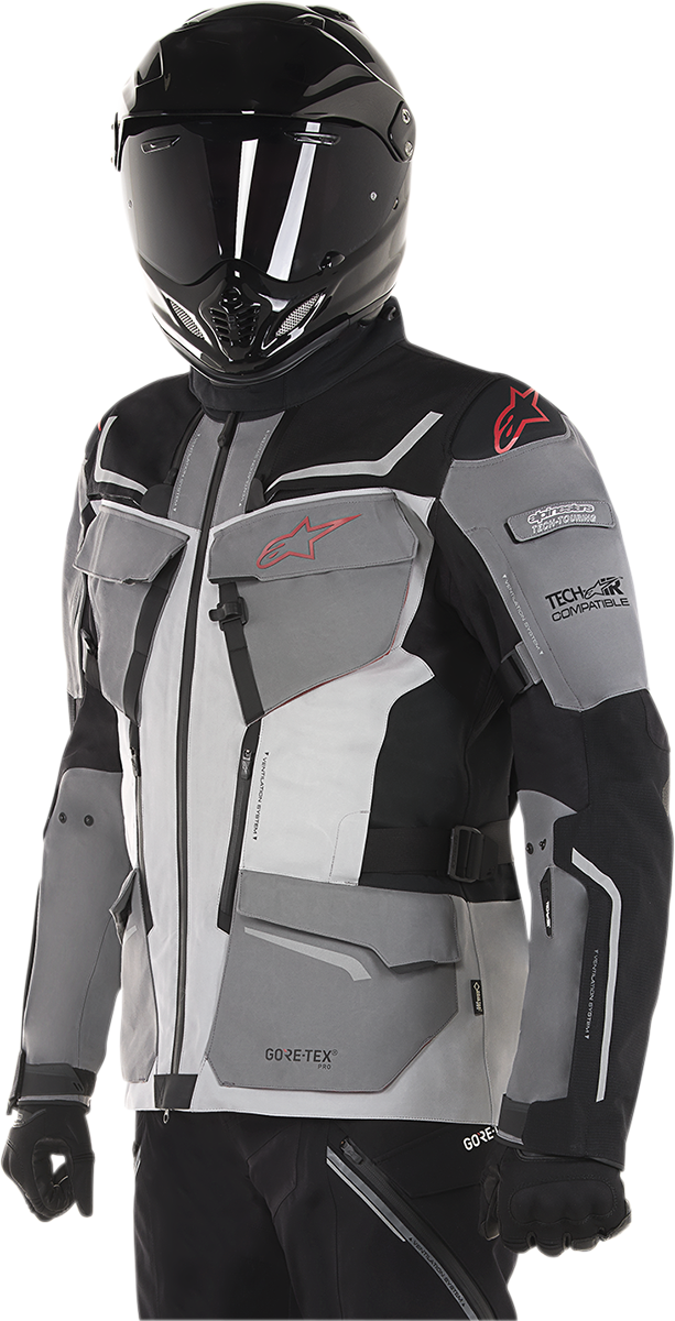 Alpinestars Revenant jacket in black, gray, and red, small size, featuring sporty design and branding, displayed on a plain background.