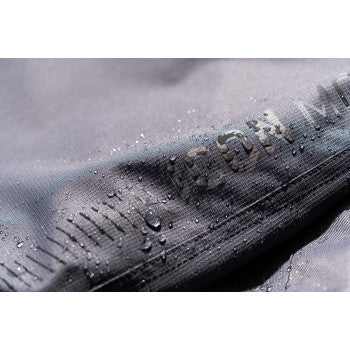 Gray ICON PDX3™ overpants in XL size, featuring durable material and design suitable for motorcycle riding.