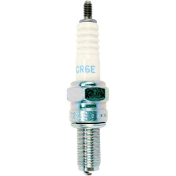 NGK spark plug 6965 standard spark plug for automotive engines, showing metal tip and ceramic insulator.