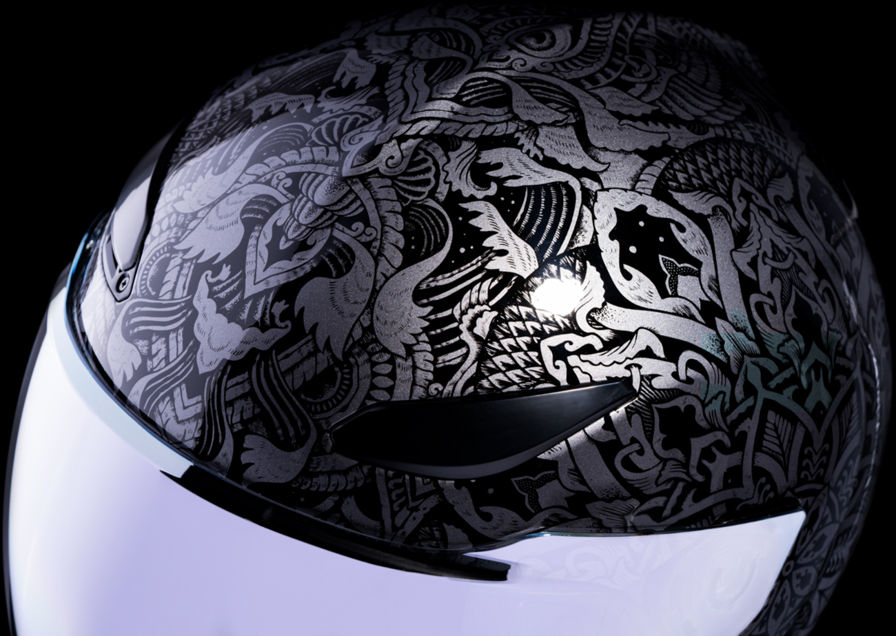 Black ICON Domain™ Gravitas helmet in XL size, featuring sleek design and ventilation, suitable for motorcycle riders.