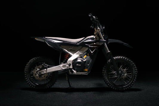 Greenger G2 electric dirt bike for kids, 50cc equivalent, with sturdy frame and off-road tires, suitable for young riders.