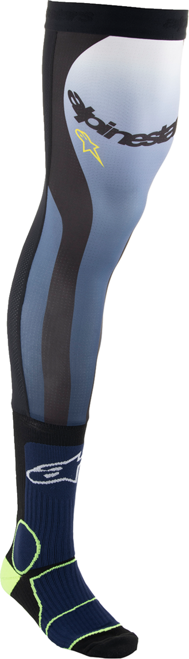 Alpinestars knee brace socks in navy, black, and yellow, large/XL size, with reinforced support and athletic design.