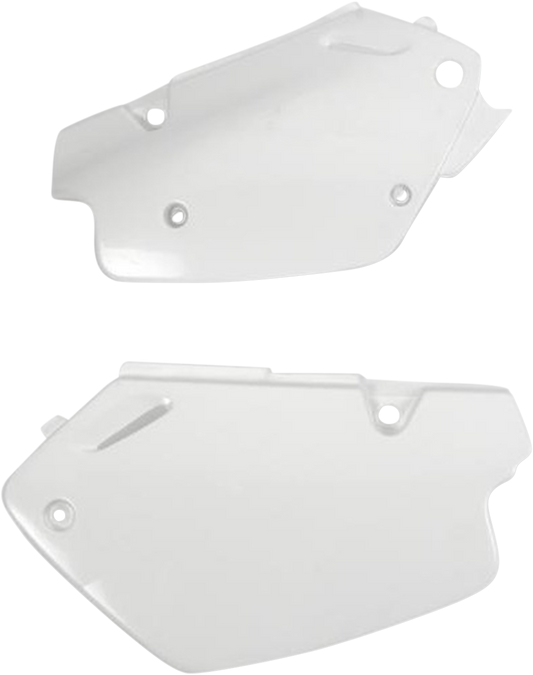 A white Acerbis side panel body part for motorcycle, featuring the Acerbis branding and mounting points visible.