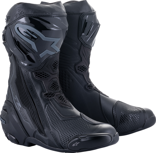 Black Alpinestars Supertech R motorcycle boots in US 9 / EU 43, featuring sporty design and protective features.