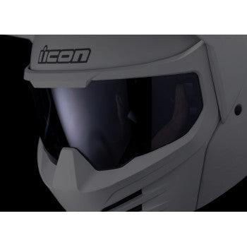 Gray ICON Elsinore™ helmet in XS size with Monotype design, featuring a sleek aerodynamic shape and secure strap closure.