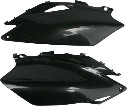 A black Acerbis side panel for motorcycle body, with smooth finish and branding details, designed for fitting on a motorcycle.