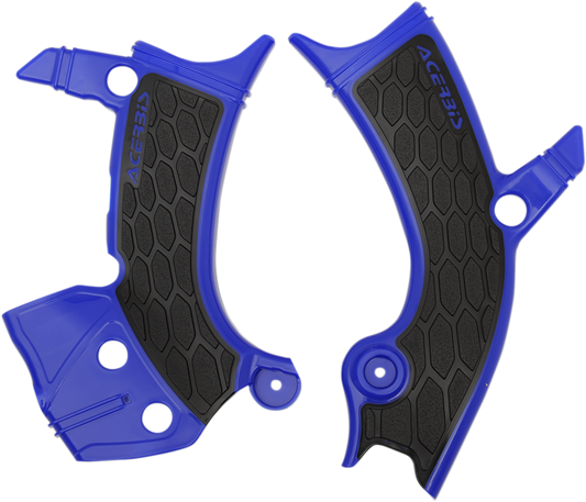 Acerbis X-Grip Frame Guards in blue and black, designed to protect motorcycle frames, displayed on a body frame.