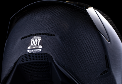 Black ICON Airframe Pro™ helmet with carbon shell, medium size, featuring sleek visor and aerodynamic design.