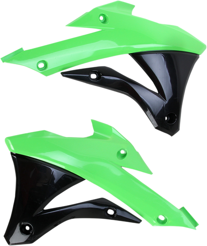 A close-up of Acerbis radiator shrouds in green and black, designed for motorcycle body protection, showing their vibrant color and shape.