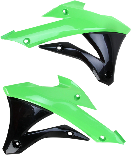 A close-up of Acerbis radiator shrouds in green and black, designed for motorcycle body protection, showing their vibrant color and shape.