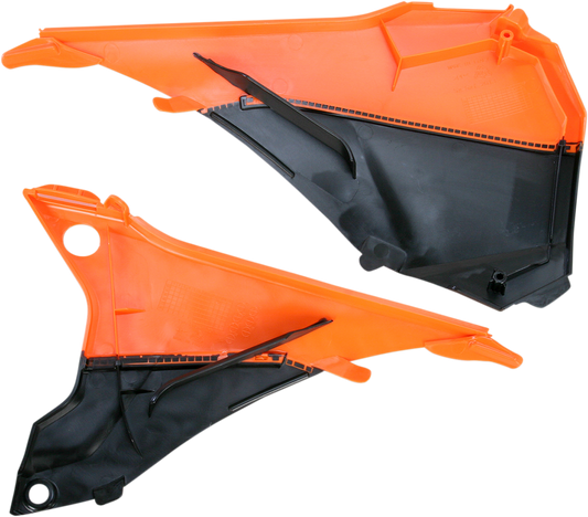 Acerbis orange and black airbox cover for motorcycle, body part with vented design and Acerbis branding, on a plain background.