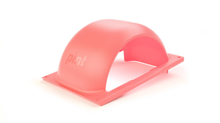 Onewheel Pint fender in coral color, custom-fit bike accessory designed to protect against mud and debris during rides.