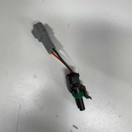 Elektrisches Racing Baja Designs S2 adaptor for Sur-Ron, Talaria MX3, and E-Ride Pro electric bikes, shown with connector and mounting details.