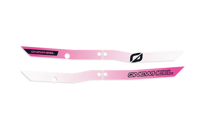 Onewheel XR Classic FuschiaFade Recurve Rail Guards installed on electric skateboard for added protection and style.