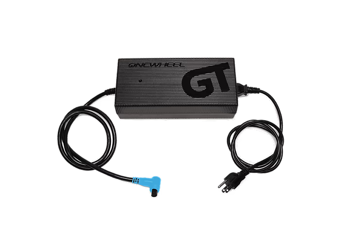 Onewheel GT-S Series Hypercharger for fast charging, with sleek black design and compact size, compatible with Onewheel electric skateboards.