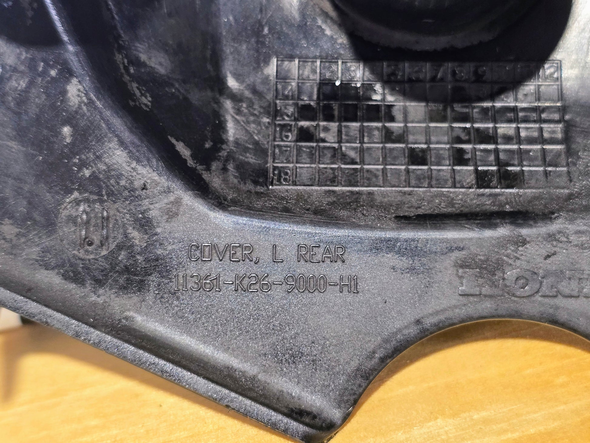 HONDA GROM 125 ENGINE SPROCKET COVER OEM 11360-K26-B00 (Used) - Howling Moto