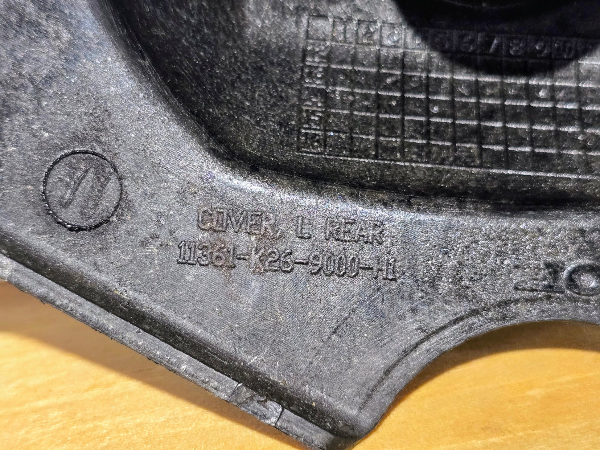 HONDA GROM 125 ENGINE SPROCKET COVER OEM 11360-K26-B00 (Used) - Howling Moto