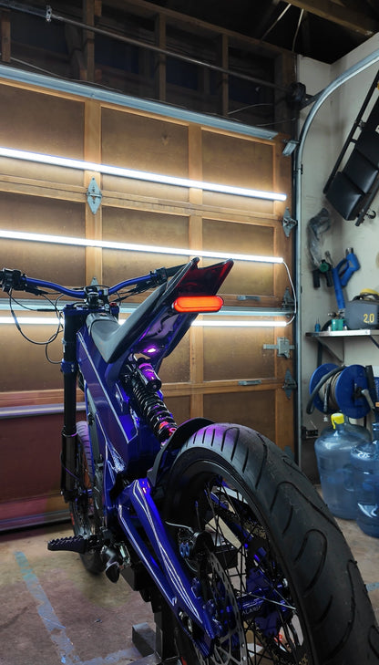 Project 9 Cyber Brake Light for Talaria XXX electric scooter, showing sleek red LED brake light mounted on the scooter.