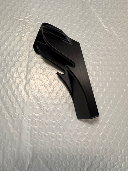 Slim-flush motorcycle helmet wall mount by McCoy Industries, designed to securely display and store helmets on the wall.