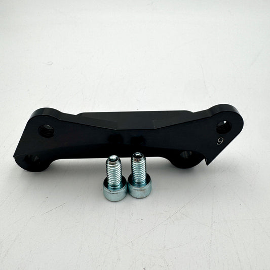 Warp9Racing Bracket for 9th Gen KLR650 motorcycle, showing the sturdy metal mounting bracket on a plain background.