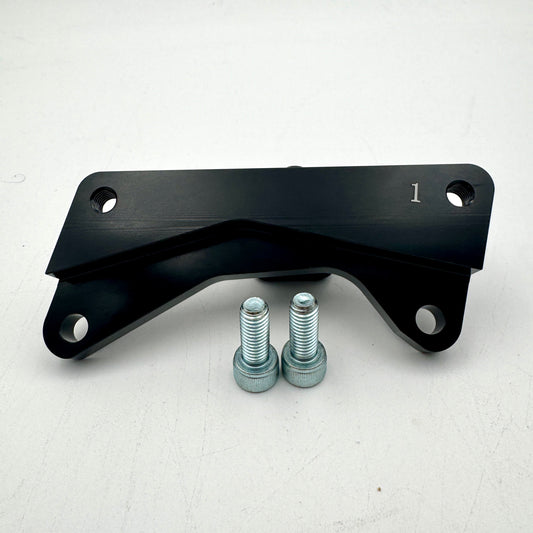 Warp9Racing Bracket 1 YZ, WR, DRZ, KX, RMZ motorcycle part mounted on a bike frame.