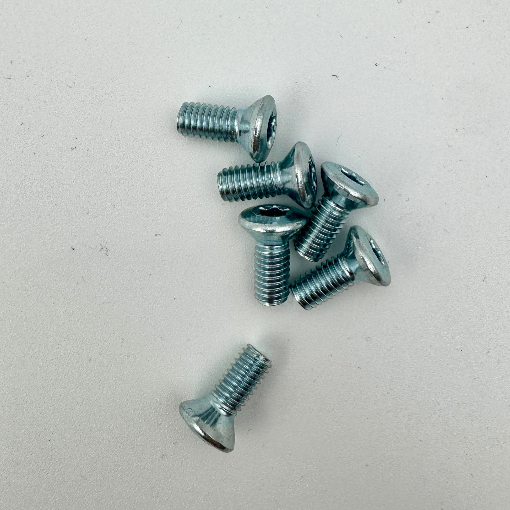 Yamaha rotor bolt, M6 x 23mm stainless steel bolt from Warp9Racing, showing the bolt with threads and polished surface