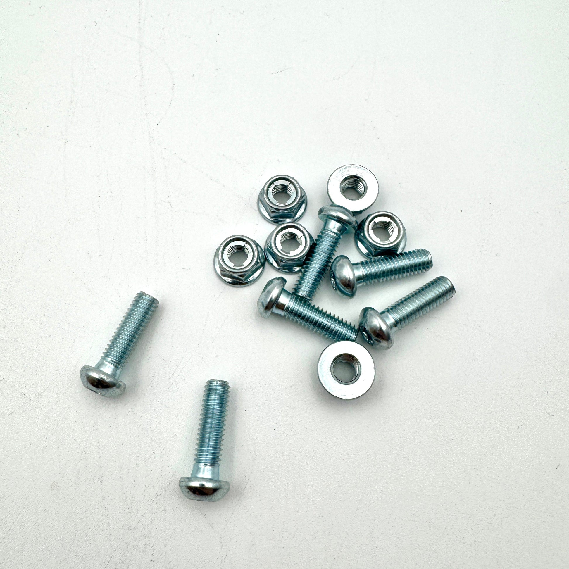 Honda rotor bolt M6x20 from Warp9Racing, showing the black metal bolt with threading and hex head for motorcycle brake rotor installation.