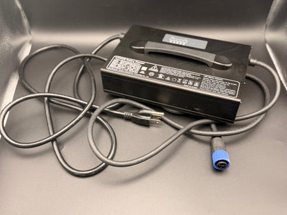 Greenger OEM battery charger for G3 and G3S models, shows the compact charging device with power cord and LED indicators.