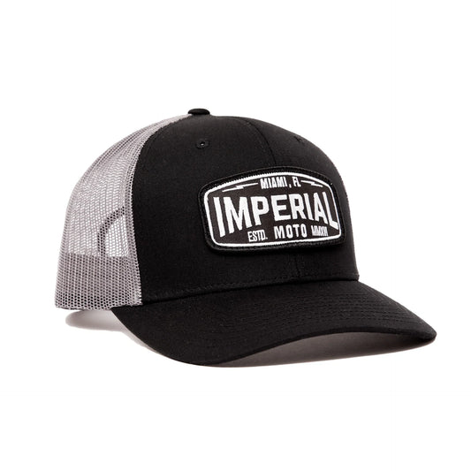 Black Imperial Moto Trucker 2.0 hat by Bill's Exhausts with mesh back and embroidered front logo, in stock and ready to wear.