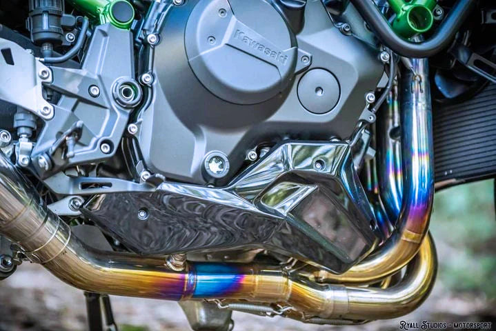 Polished titanium exhaust system for Kawasaki Ninja ZH2 2020-2025, open box, by Bill's Exhausts, with sleek metal finish and detailed construction.