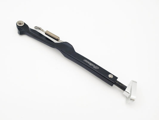 Warp9Racing KTM Husqvarna GasGas OEM adjustable length kickstand showing metal construction and mounting bracket on a motorcycle.