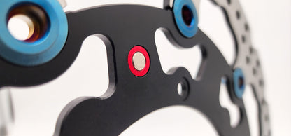 KTM Rotor Speedo Magnet V3 installed on motorcycle wheel, branded Warp9Racing, for accurate speedometer readings.