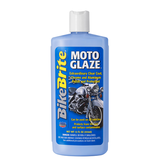 Moto Glaze® by Bike Brite Online, close-up of shiny black motorcycle paint with reflective finish and smooth surface.