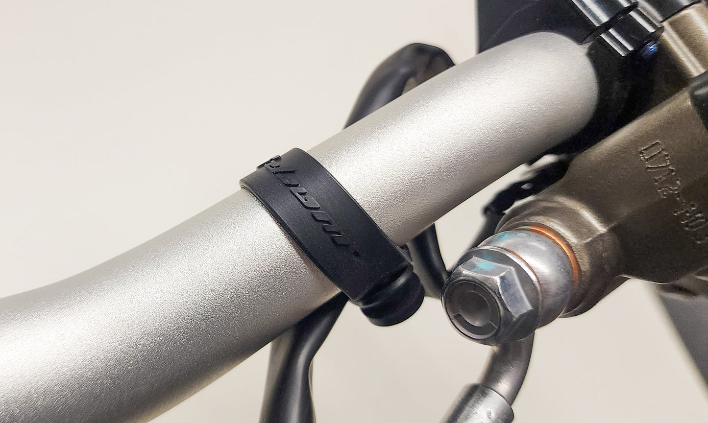 Warp9Racing Surron bar straps by Collective, durable motorcycle handlebar accessories for secure grip and control.