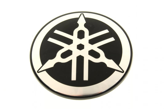 Yamaha OEM emblem badge, model 1RC-2413B-02-00, shiny metallic Yamaha logo for motorcycle or vehicle decoration