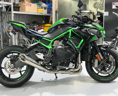 Vandemon polished titanium exhaust system on Ninja ZH2 motorcycle, full titanium finish, installed and showcasing sleek design.