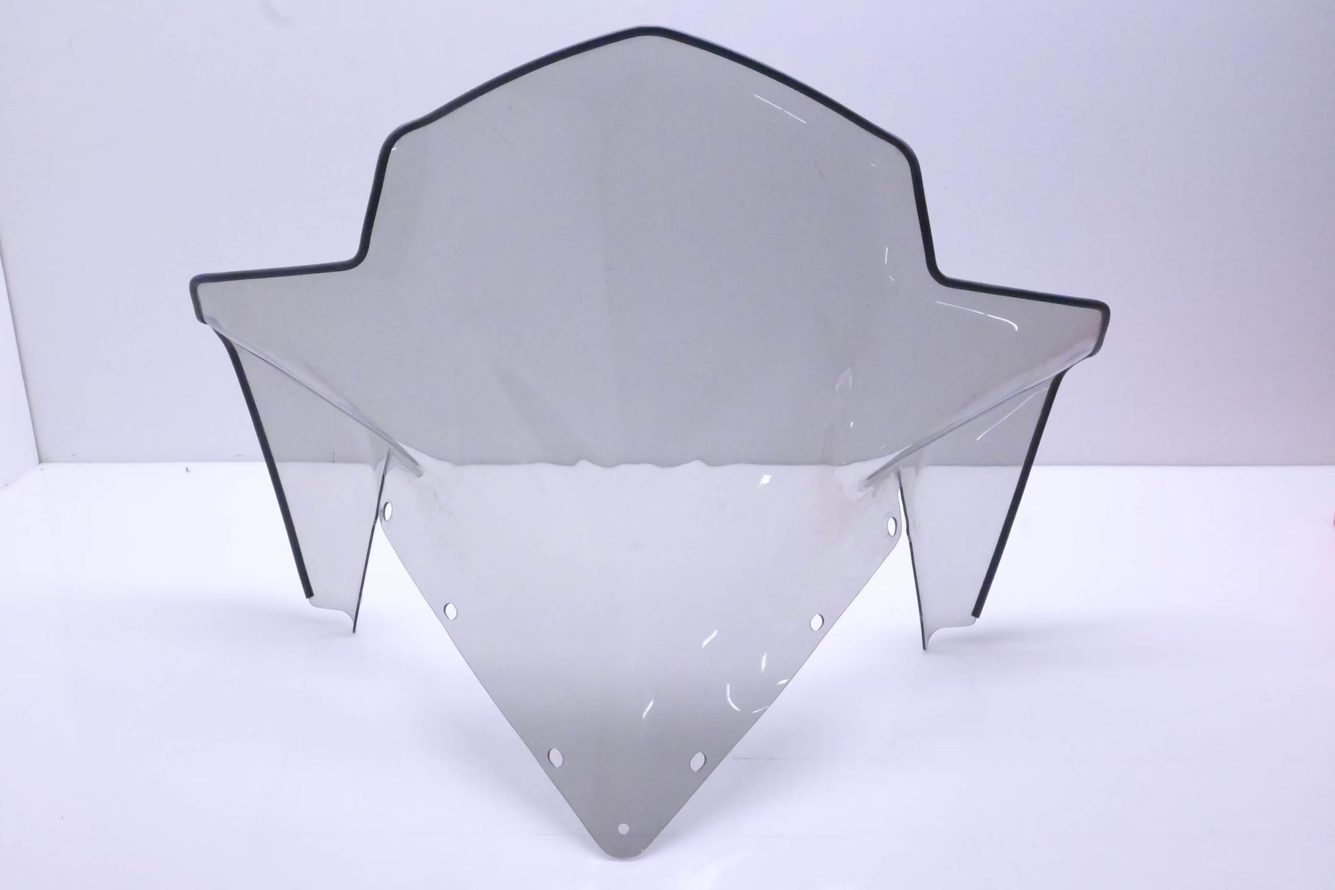 Polaris OEM windshield in smoke tint, tall and wide design, made for Polaris off-road vehicles, providing wind protection.