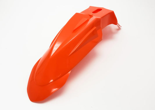 Orange Warp9Racing SuperMoto front fender for slim MX to SM conversion, made of body plastics and fairings.