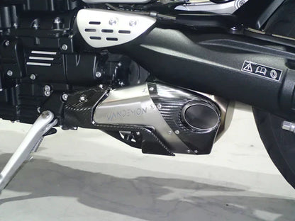 Open box Vandemon Triumph Rocket 3R & GT titanium stealth slip-on mufflers, motorcycle exhausts with sleek metallic finish.