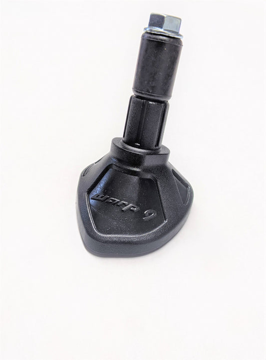 Warp9Racing kickstand footpad attached to motorcycle kickstand, providing stability and protection for the bike's kickstand.
