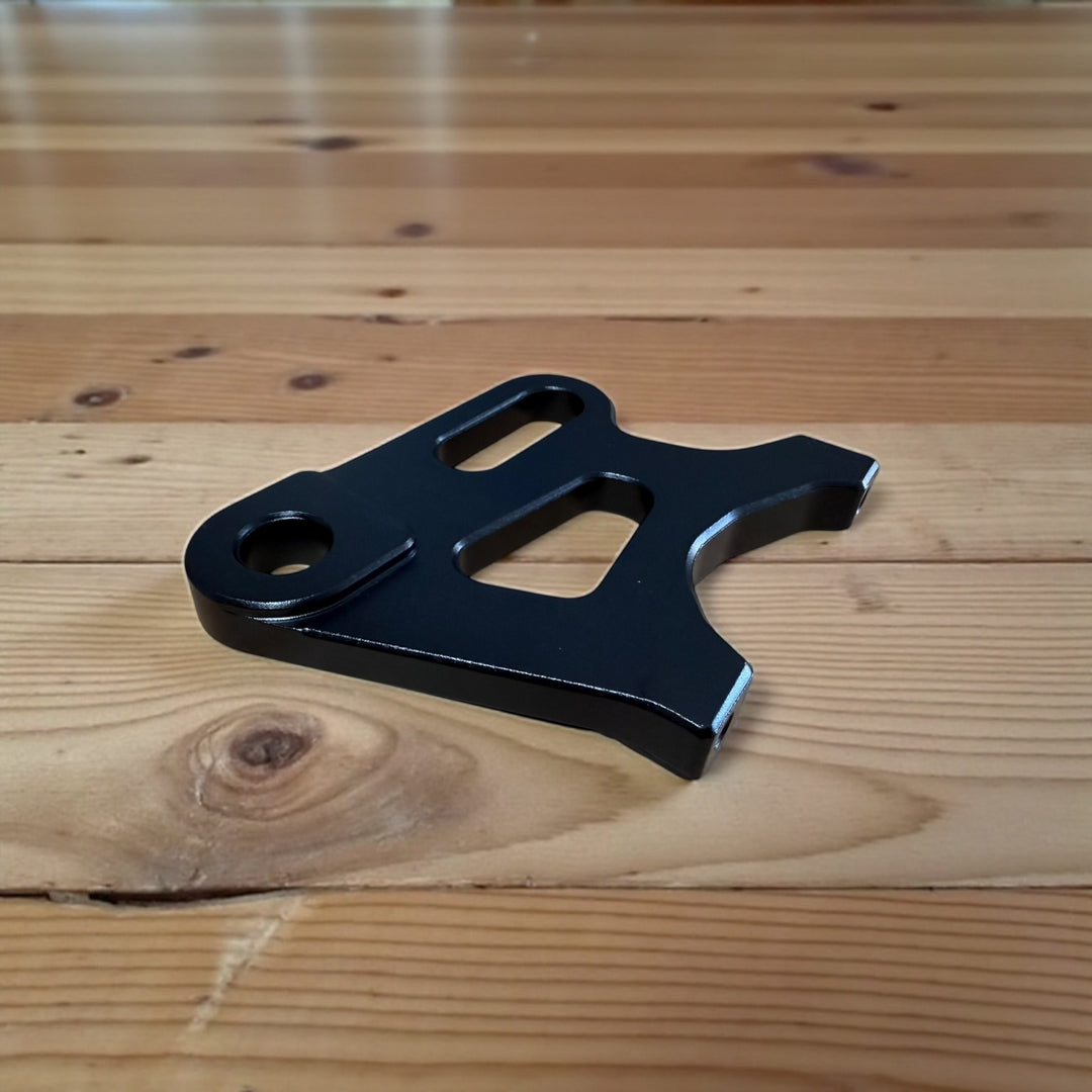 Electro & Co ETM RTR anodized brake brackets set in black, red, blue, green, and purple for front and rear bike braking system