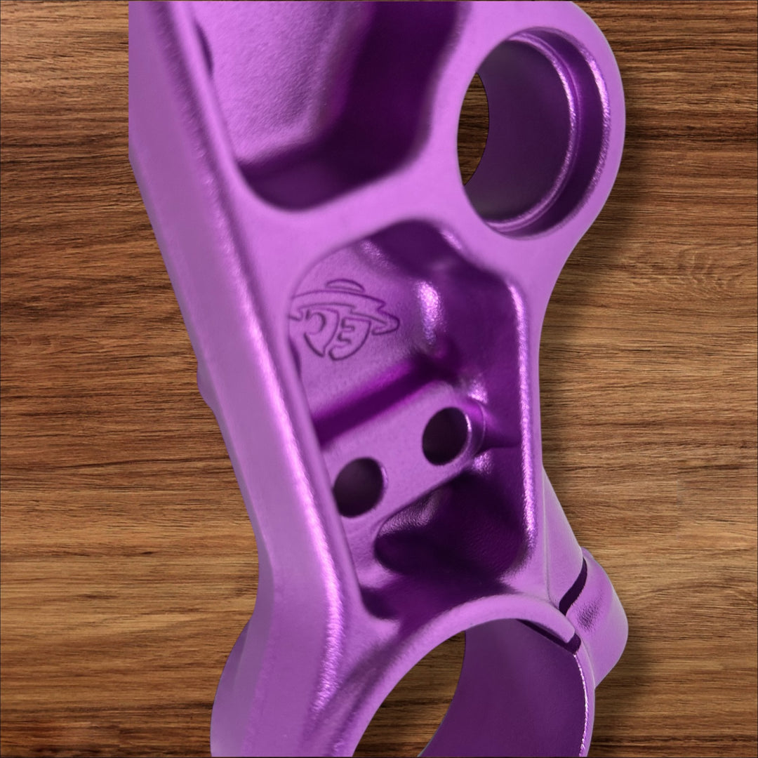 Electro & Co ETM RTR anodized triple clamps set in custom colors, featuring upper and lower replacement clamps for motorcycle.