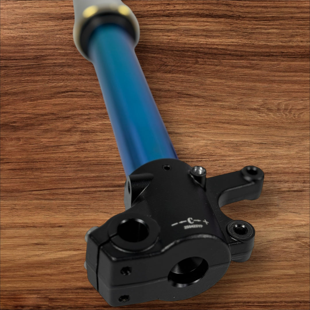 Electro & Co ETM RTR Oil Slick adjustable suspension forks with multi-color finish for mountain bikes.
